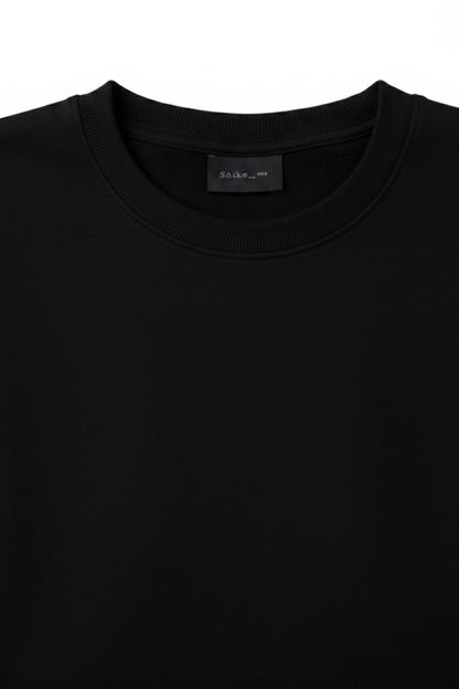 Pairfit black crew neck short sleeve t-shirt with a minimalist design and ribbed neckline